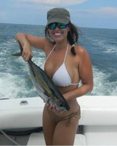 girl with yellowfin tuna